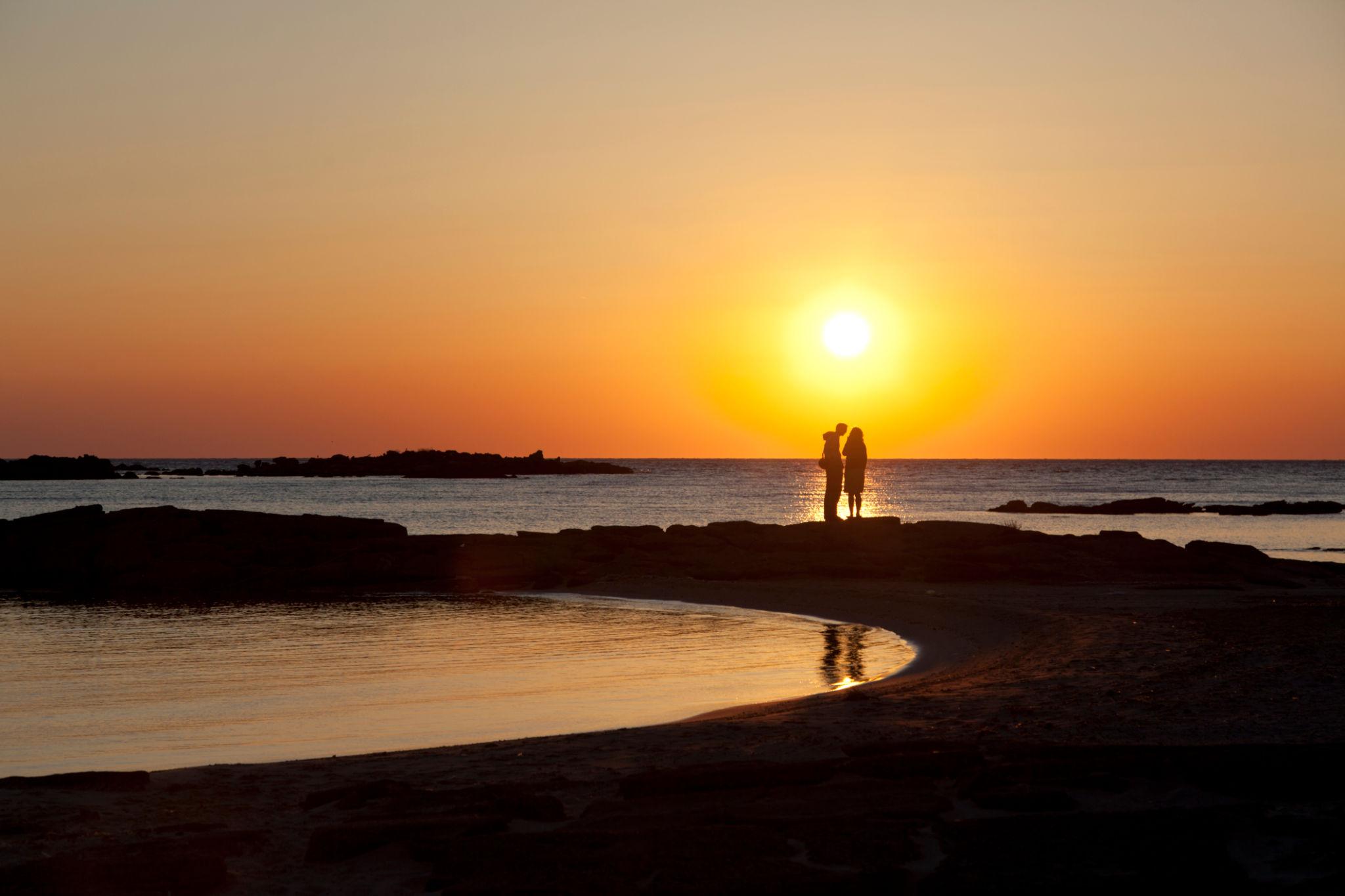 Couple at sunset on Elafonisi beach, Crete, Greece